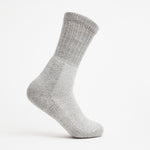 Thorlos trekking crew sock in light grey with cushioned sole and ribbed cuff
