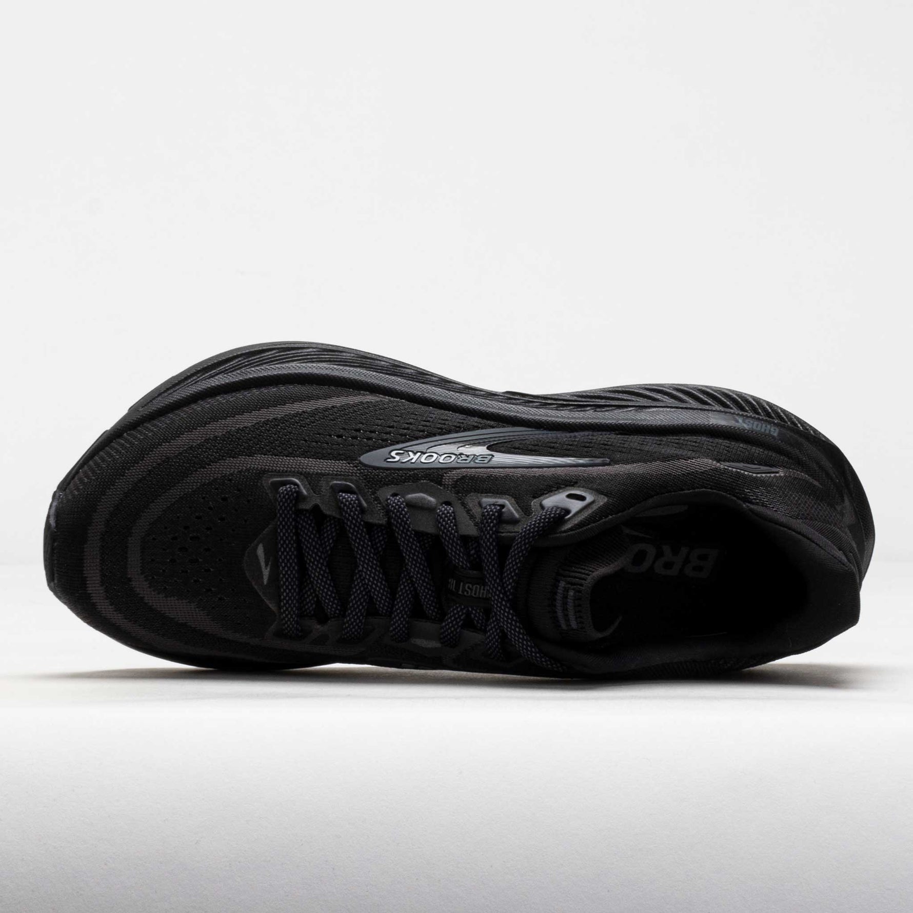 Brooks Ghost 18 running shoe in black colorway, top-down view showing laces and upper