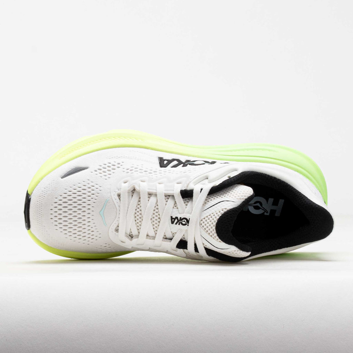 HOKA Bondi 9 running shoe in white and tart apple green, top-down view