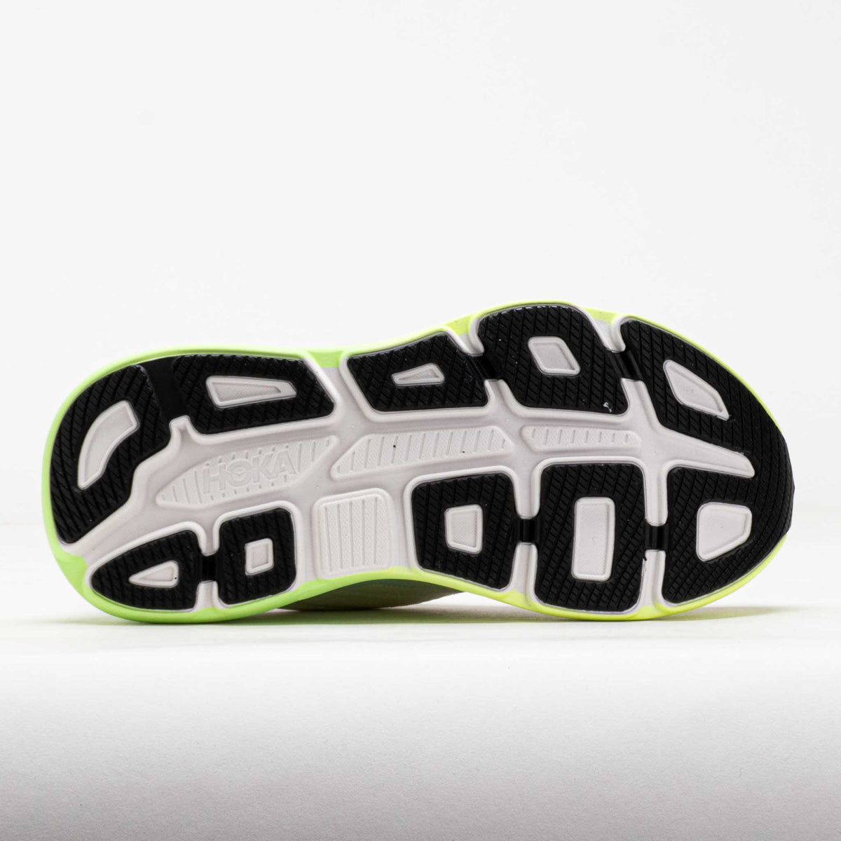 HOKA Bondi 9 running shoe outsole view showing white and tart apple green sole