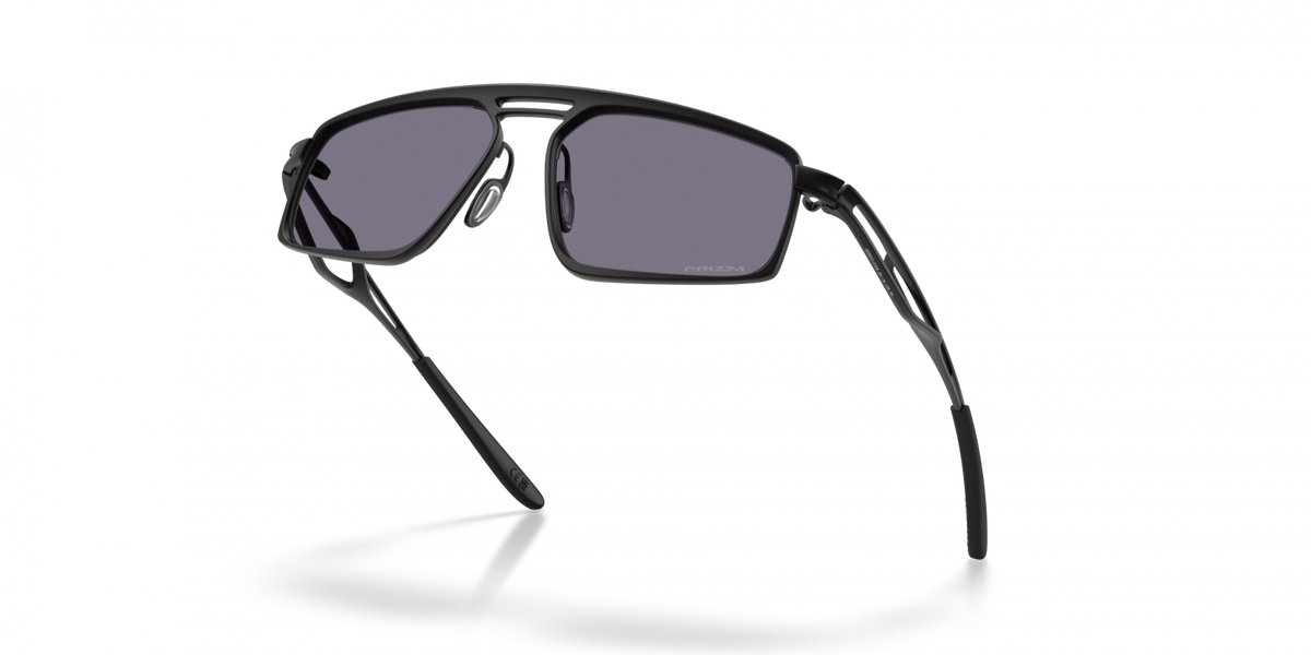 Oakley Bushwick sunglasses rear elevated view showing satin black frame and grey lenses