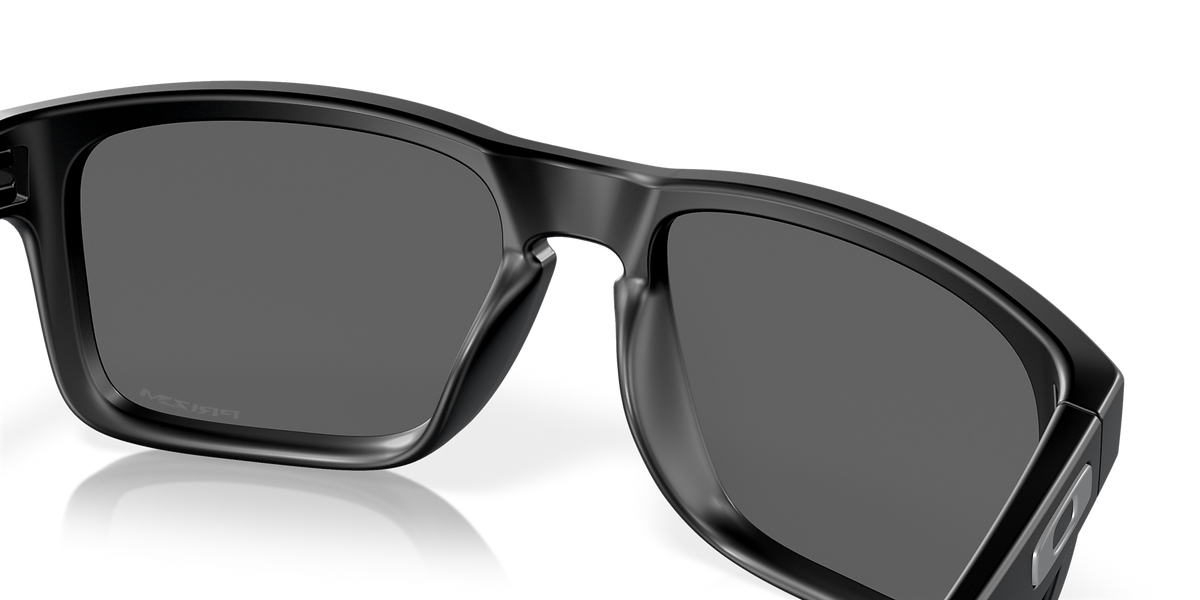 Close-up detail of Oakley Holbrook matte black frame bridge and Prizm Black lenses