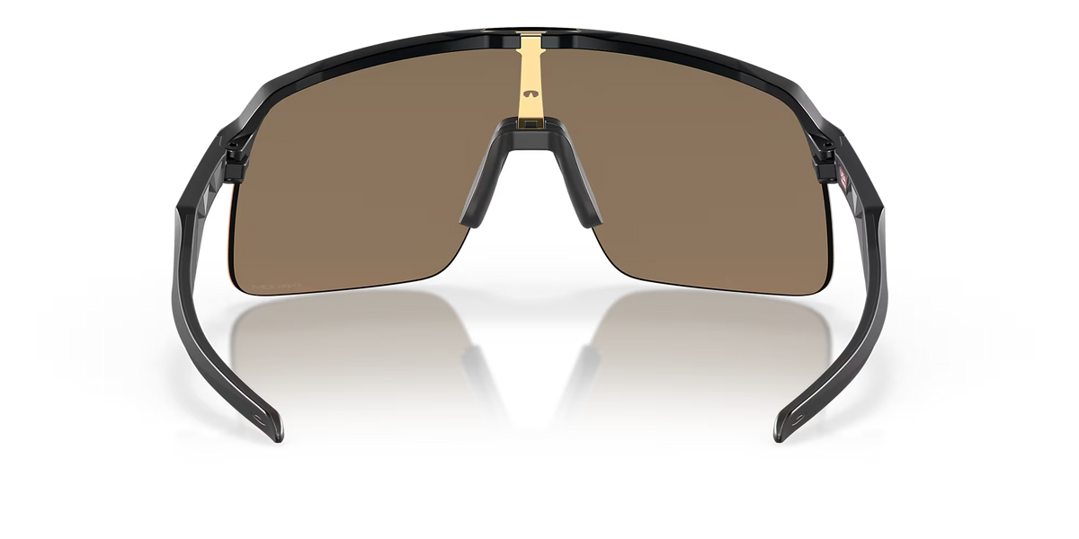 Oakley Sutro Lite Matte Carbon sunglasses rear interior view showing gold nose bridge and frame construction