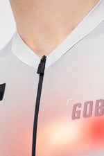Detailed close-up of Gobik Attitude 2.0 jersey collar and black zipper with Flank gradient pattern
