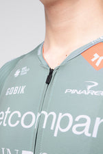 Gobik Raeactive Men Ineos Netcompany cycling jersey in sage green with orange collar detail