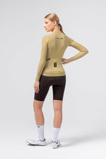 Gobik Avalon Long Sleeve Jersey in Keemun color worn by female model, rear view