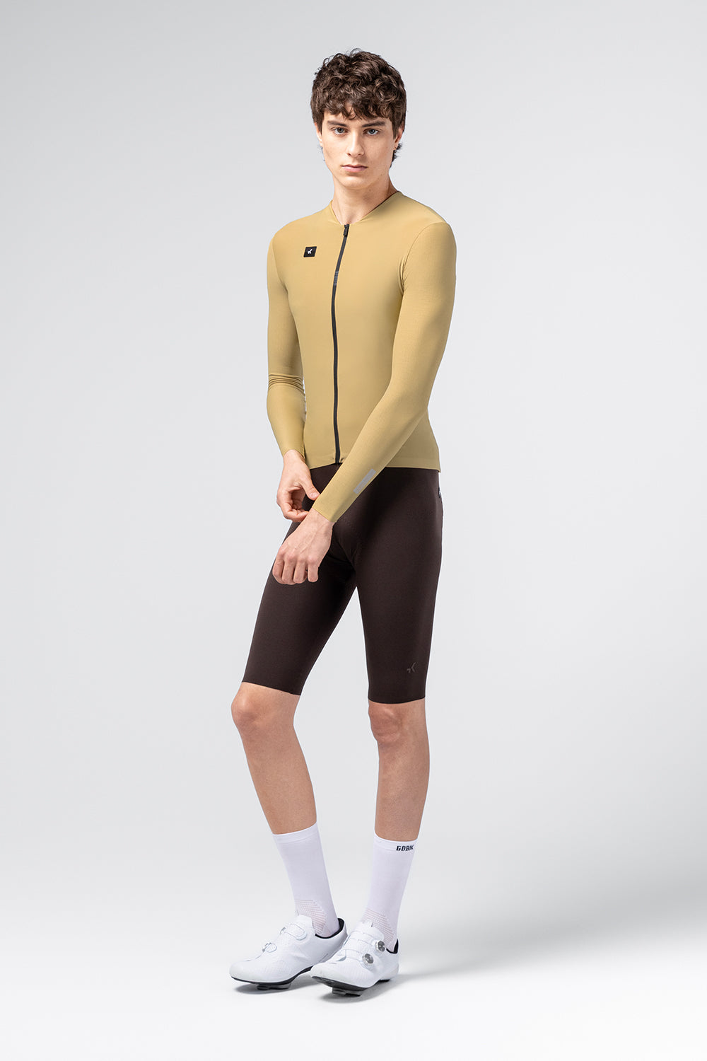 Gobik Avalon Long Sleeve Jersey in Keemun color on male model, front full-body view
