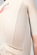 Close-up detail of Gobik CX Pro 4.0 jersey back panel showing textured breathable fabric in almond