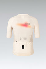 Gobik CX Pro 4.0 almond cycling jersey rear view showing orange gradient graphic and back pocket details