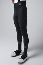 Professional product photo of black Gobik Absolute 7.0 bib shorts on model