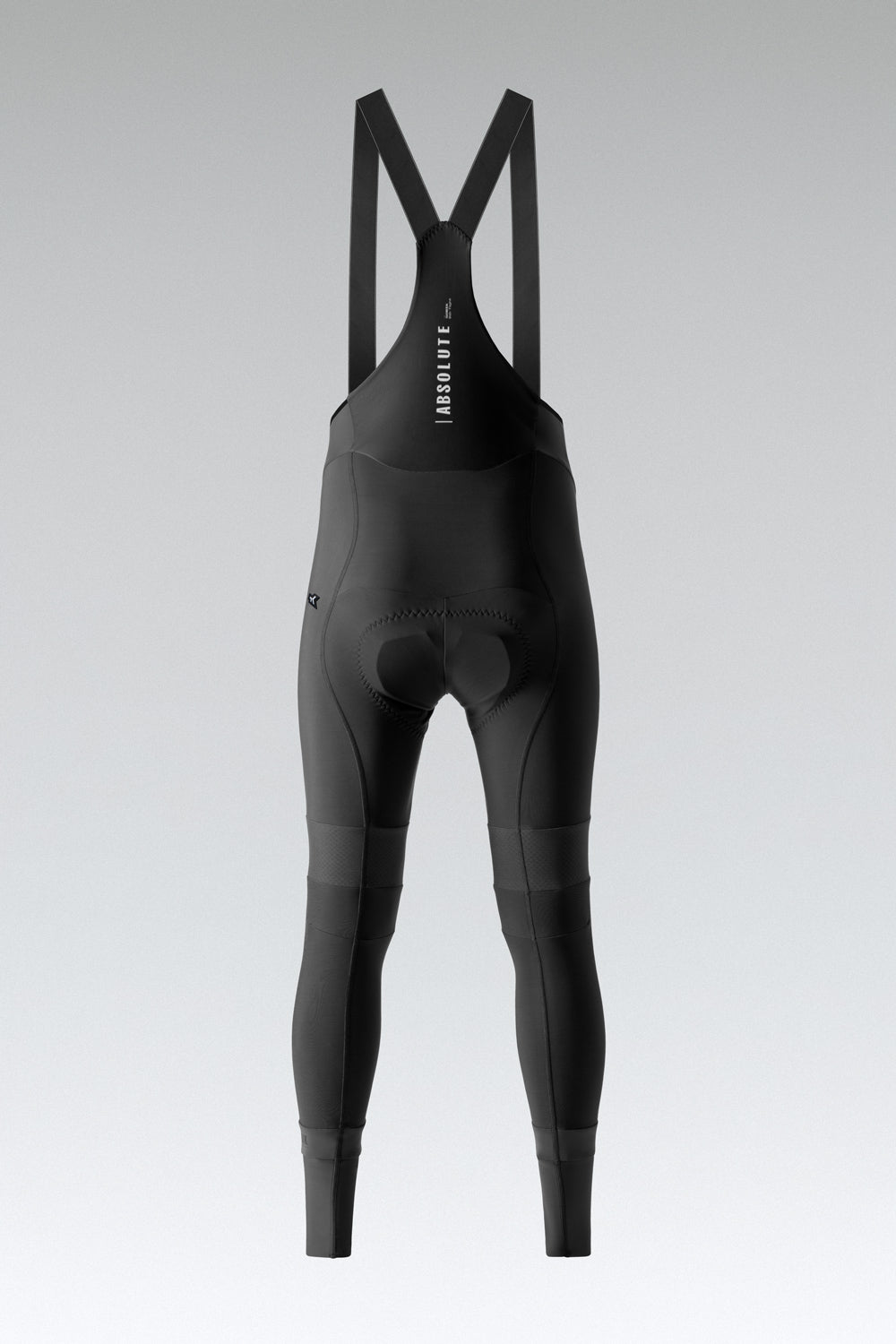 Black Gobik Absolute cycling bib shorts with suspender straps on gray background