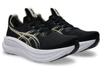 ASICS Gel Nimbus 28 running shoes in black with gold accents and white sole