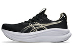 ASICS Gel Nimbus 28 running shoe in black with gold stripes and white midsole