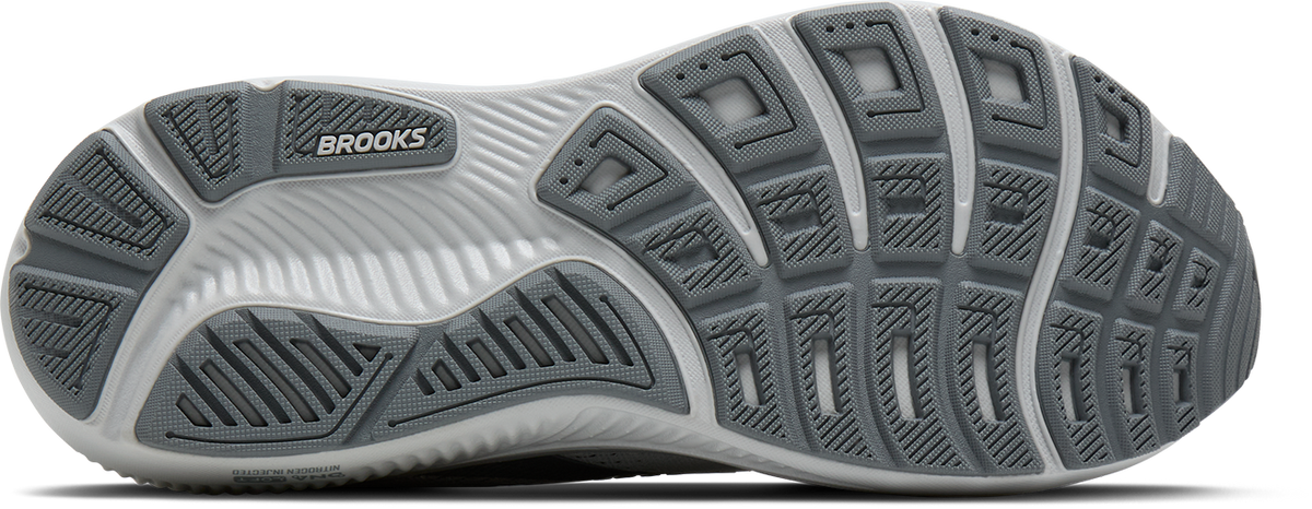 Brooks Ghost 18 running shoe outsole view showing grey rubber tread pattern on white midsole