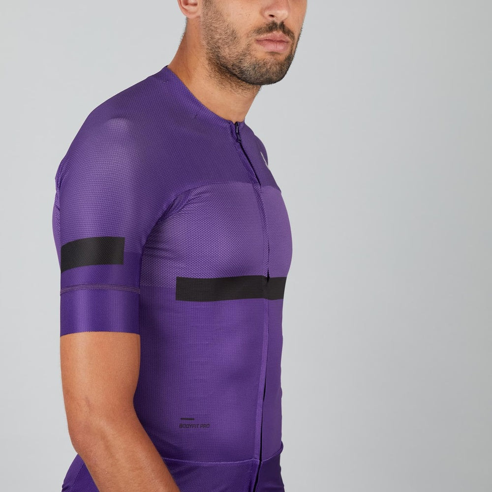 Sportful Evo Jersey in violet purple with black chest stripe, side view on male model