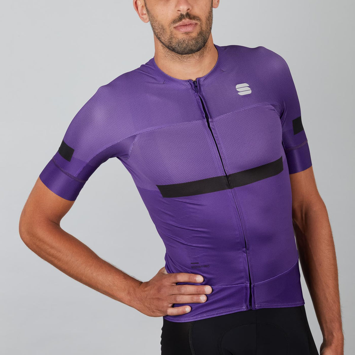 Sportful Evo Jersey violet purple cycling jersey with Sportful logo, three-quarter front view on model