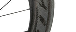 Zipp 808 NSW Carbon Tubeless Disc Wheel closeup showing carbon fiber rim and tire tread