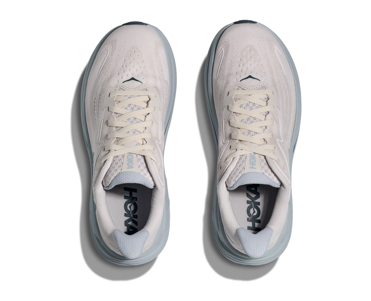 Top-down view of pair of HOKA Clifton 10 women's shoes in Grout Mineral Blue colorway