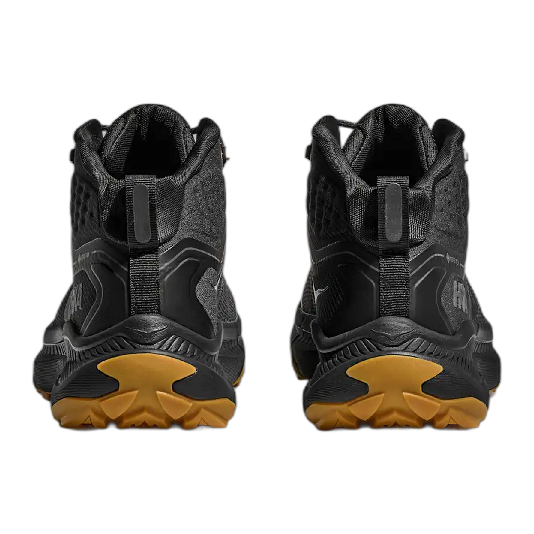 HOKA Transport Hike GTX mid-cut hiking boots in black with gum outsole, rear view