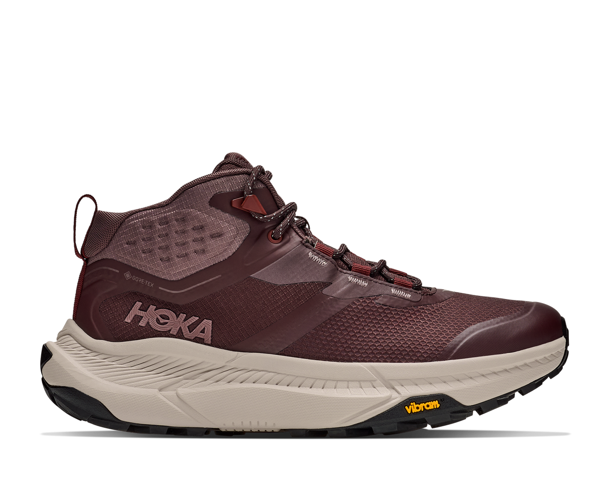 Hoka Transport Hike GTX boot lateral view showing GORE-TEX and HOKA branding in deep mauve