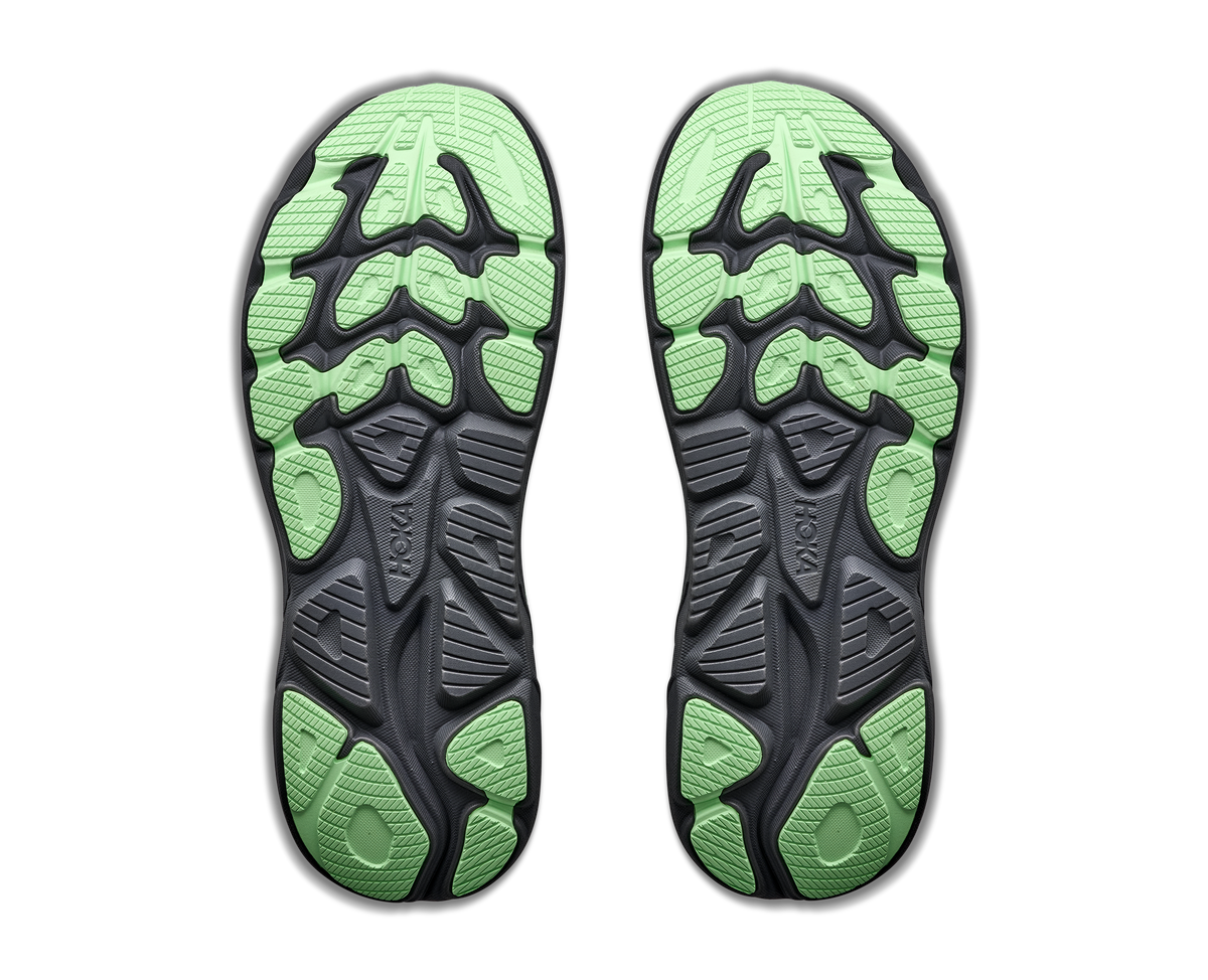 Bottom sole view of pair of HOKA Clifton 11 shoes showing green and black tread pattern