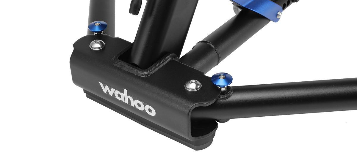 Close-up of Wahoo KICKR trainer base showing Wahoo branding and blue accent hardware