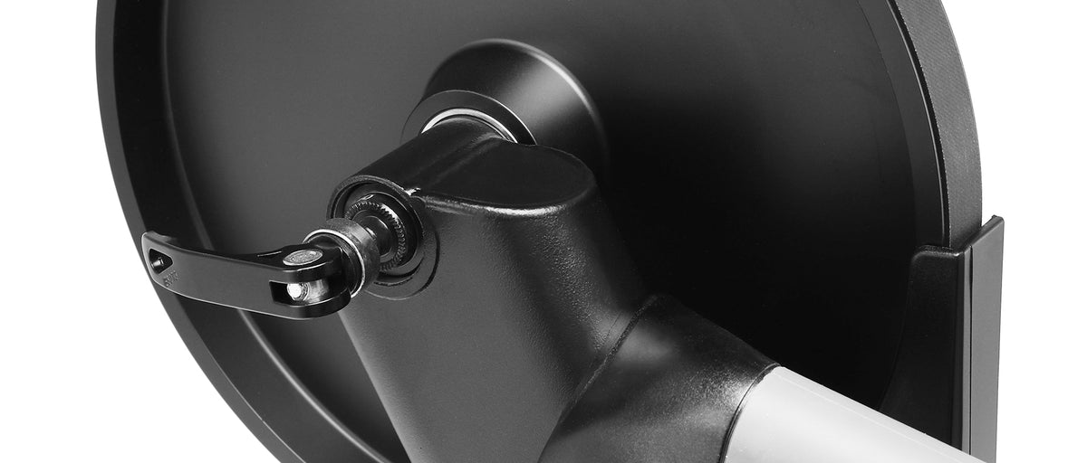 Wahoo KICKR v6 smart bike trainer close-up showing flywheel and connection point detail