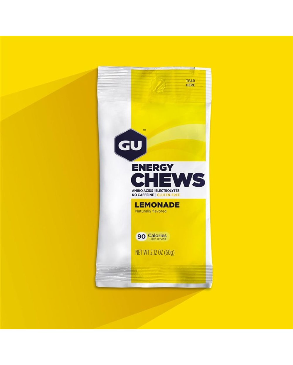GU Energy Chews Lemonade packet on bright yellow background with drop shadow
