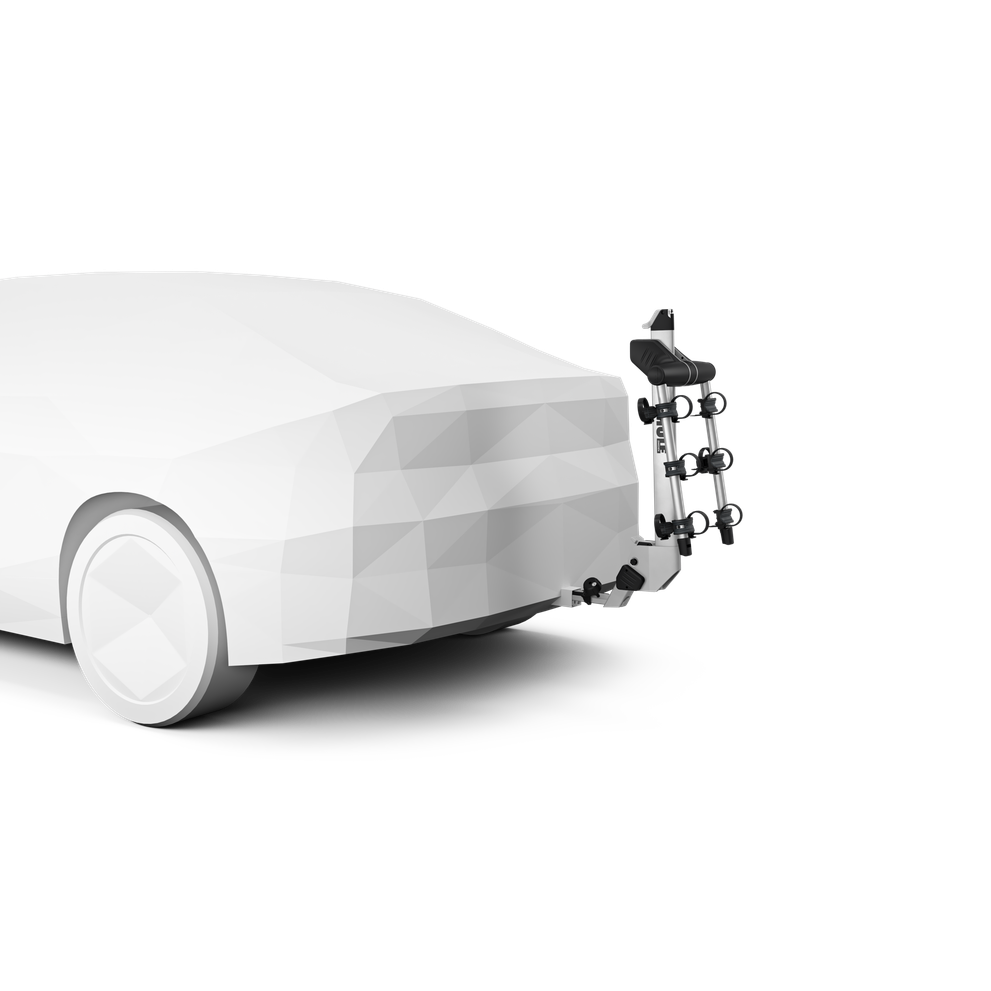 Thule Helium Pro 3 bike hitch rack mounted on rear of white sedan car