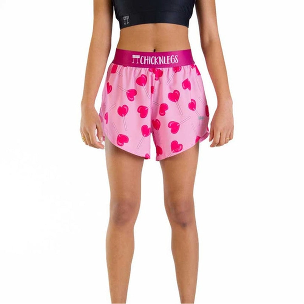 Pink ChicknLegs split shorts with heart pattern and branded waistband