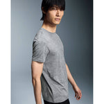 Asian male model wearing gray heather On Core-T shirt against gradient studio background
