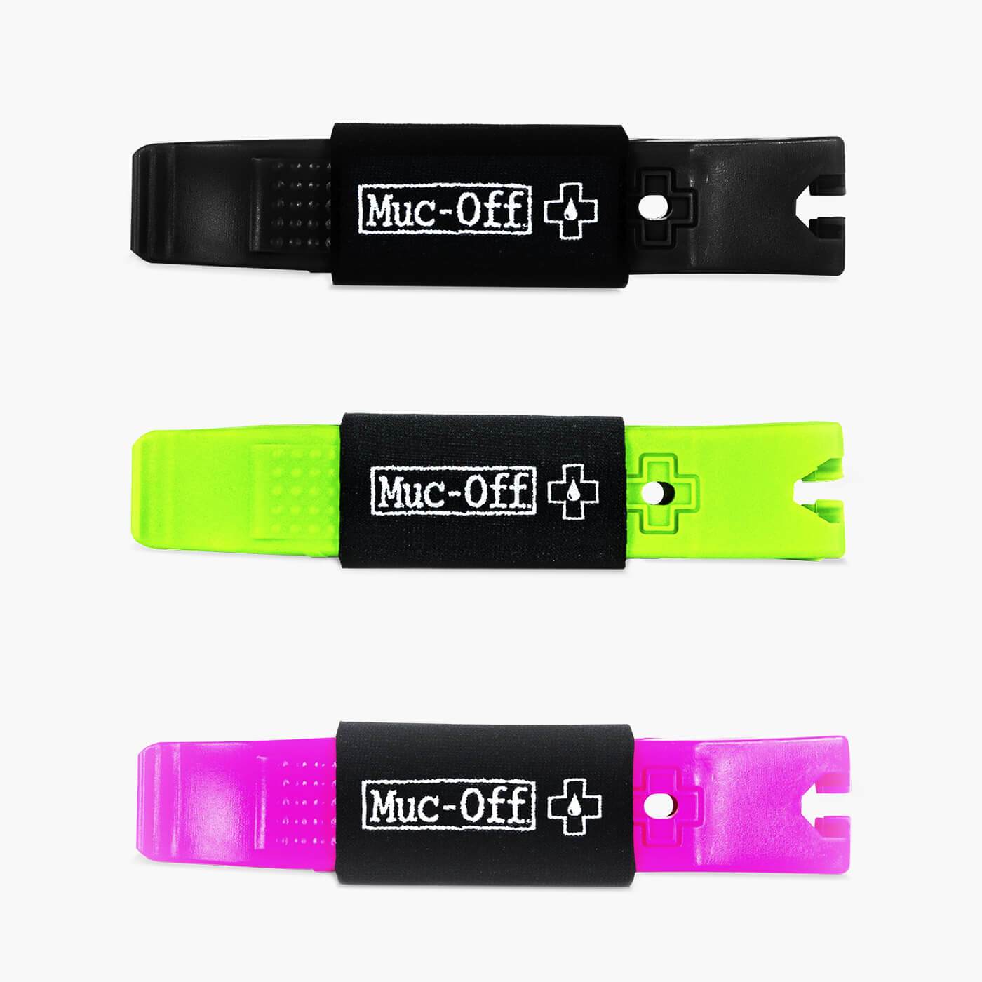 Muc-Off tire levers set with three colorful plastic tools in black, green, and pink