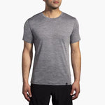 Brooks Luxe Short Sleeve men's running tee in heathered charcoal gray on model