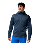 Man wearing Brooks navy heathered zip-up hoodie with blue shorts on white background