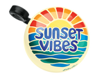 Electra bicycle bell with sunset vibes design featuring colorful sun rays and ocean waves