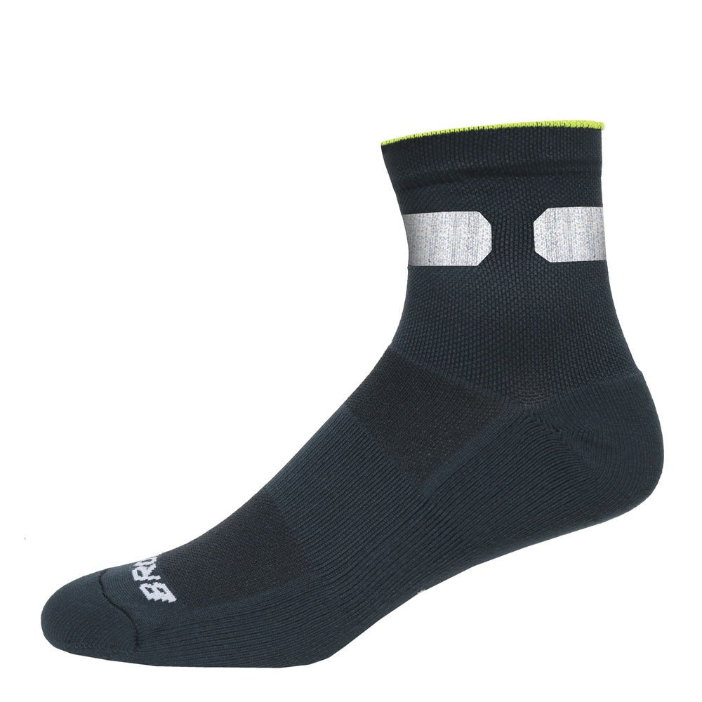 Brooks Nightlife black running sock with silver reflective panels and neon yellow cuff trim