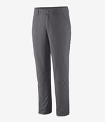 Dark gray women's hiking pants with button closure on neutral background
