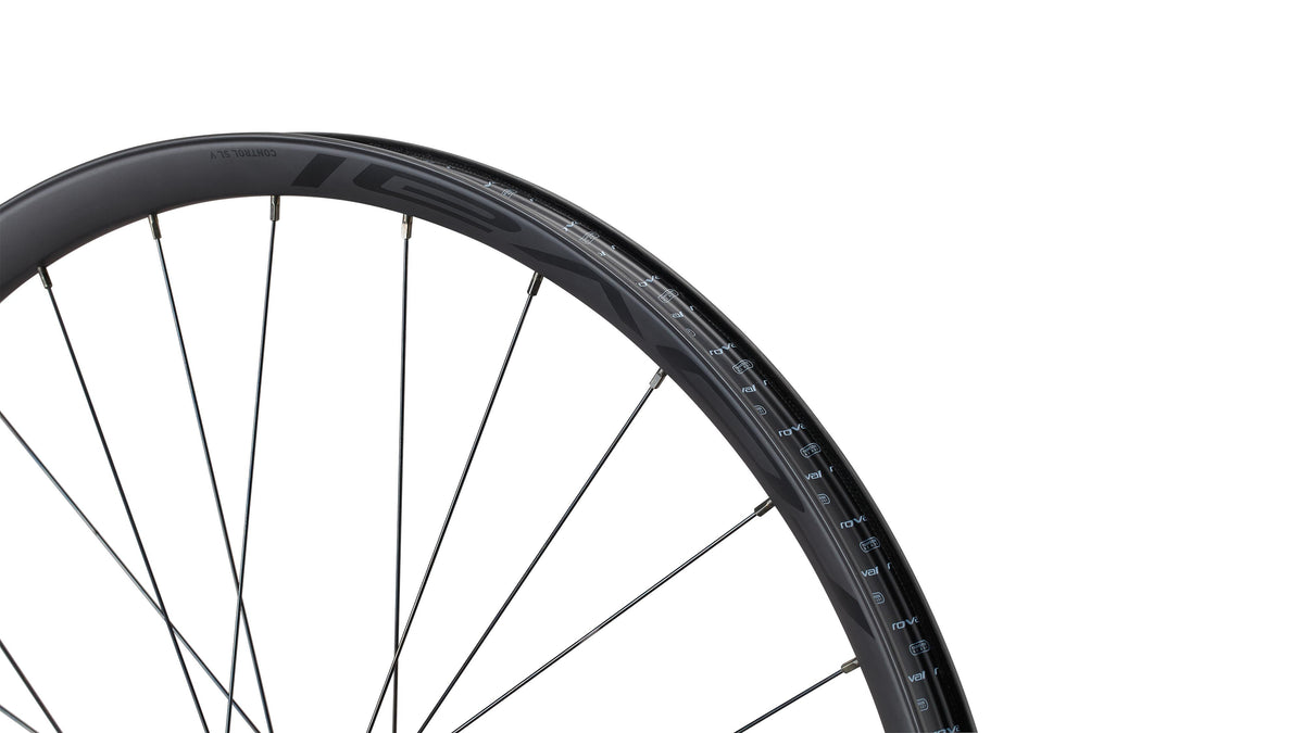 Specialized Roval Control SL V carbon bicycle wheel with black spokes on white background