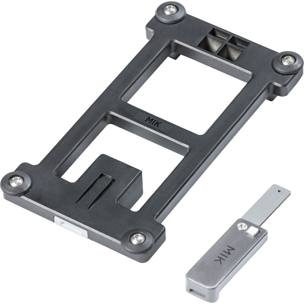 Specialized MIK Adapter Plate in dark gray with silver locking key accessory on white background
