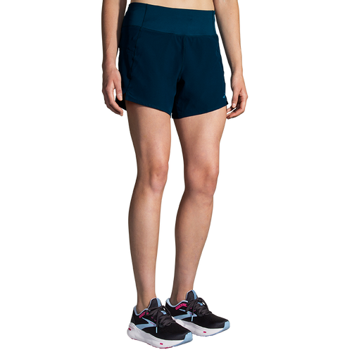 Brooks Chaser 5-inch Women's Running Shorts in Ocean Drive teal color on model