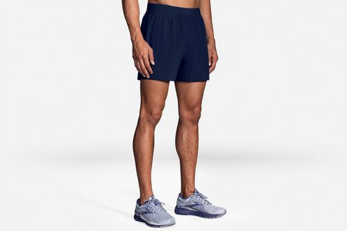 Brooks Sherpa 5-inch men's running shorts in navy blue on male model