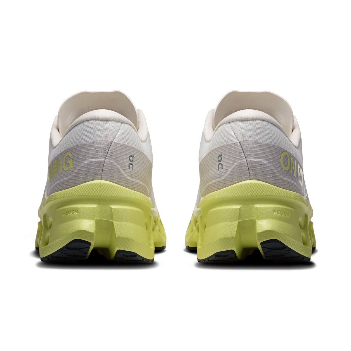On Cloudmonster 3 running shoes rear view showing ivory upper, limelight Helion midsole pair