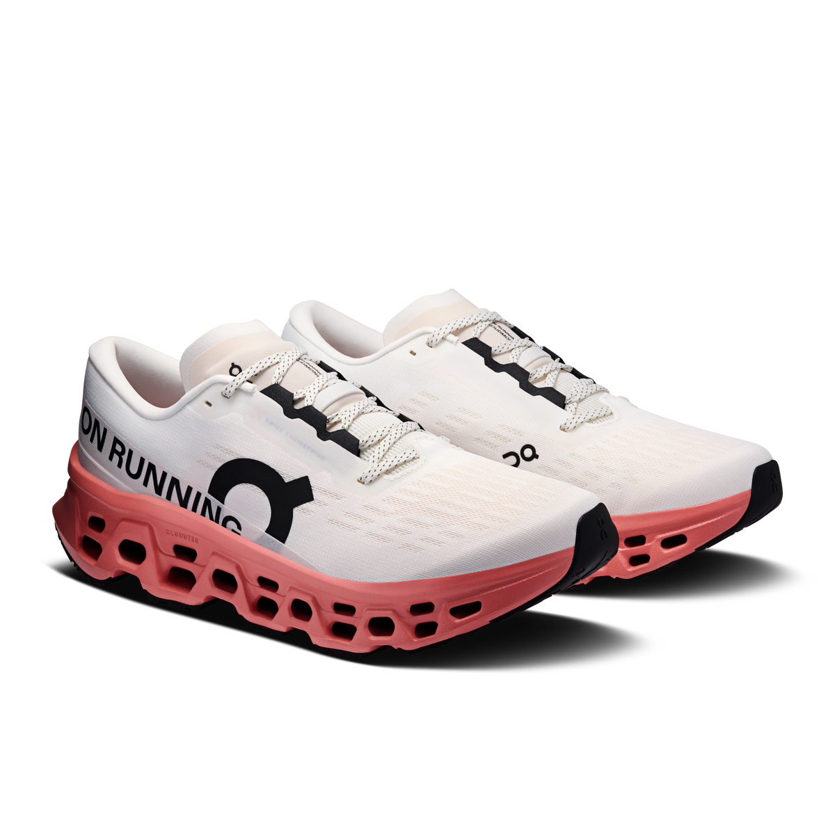 On Cloudmonster 3 running shoes pair in three-quarter view, ivory and dustrose colorway