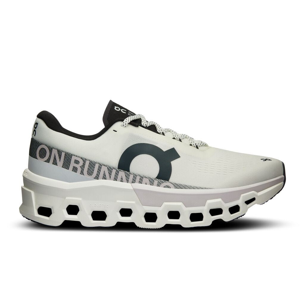 On Cloudmonster 2 running shoe in white and green colorway with distinctive cloud sole
