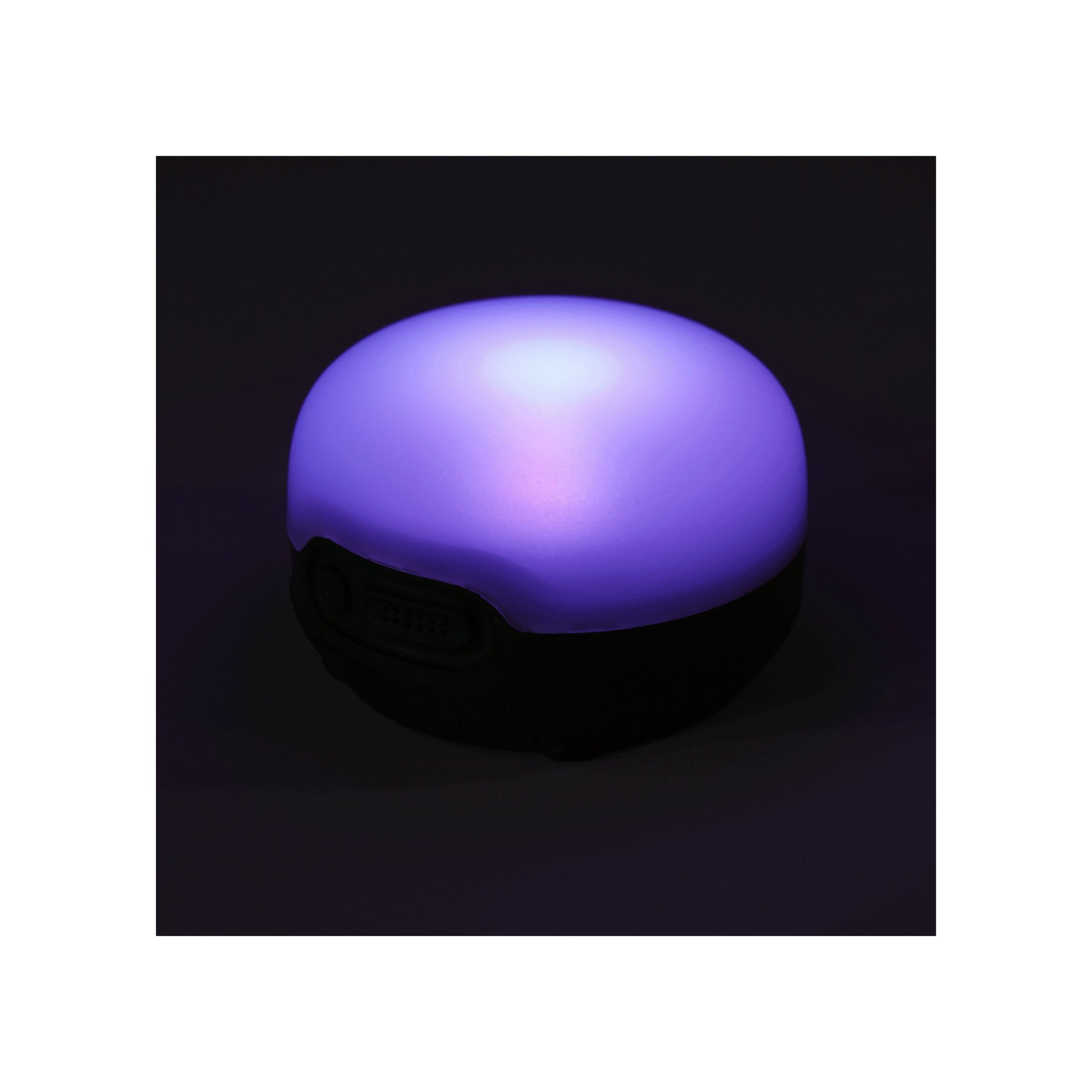 Black Diamond Moji R+ Lantern glowing purple-blue light against dark background