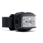Angled side view of Black Diamond Storm headlamp in black showing USB-C port and LED lenses
