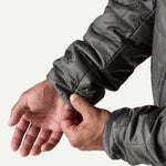Close-up of Patagonia Nano Puff Jacket cuff detail in Forge Grey showing adjustable wrist