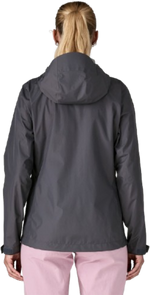 Patagonia Women's Torrentshell 3L Jacket in Smolder Blue, rear view on model