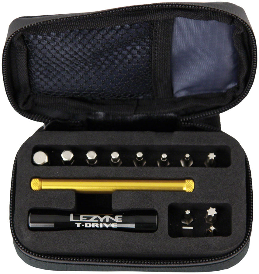 Lezyne T-Drive tool kit open case showing handle, crossbar, and multiple hex and Torx bits