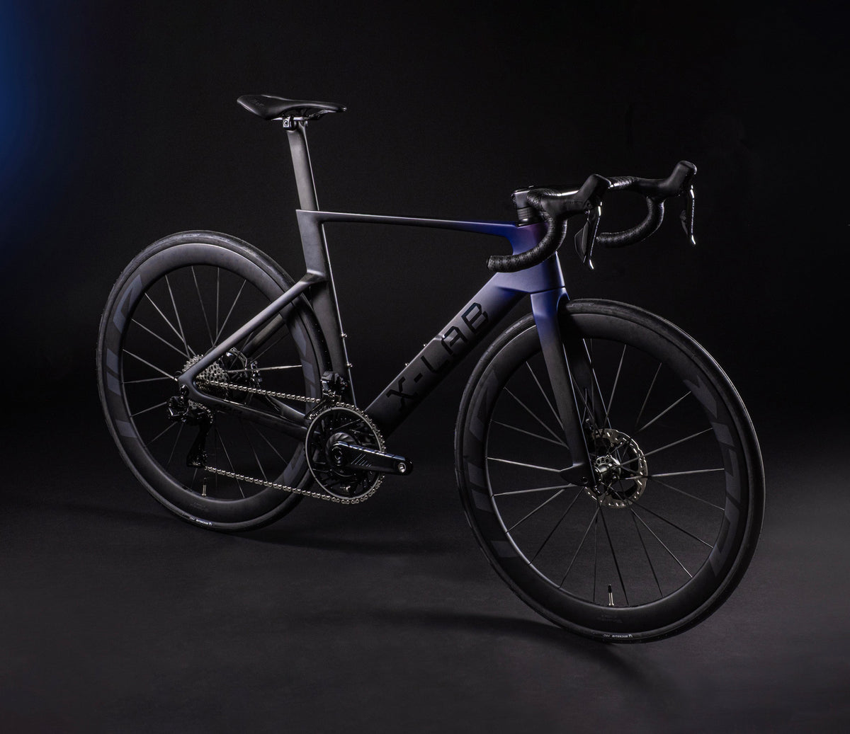 X-LAB AD9 aero road bike in dark purple-black finish shown from drive-side angle